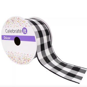 Black/red ribbon, black/white ribbon, black/red mesh , paper mache candy canes.